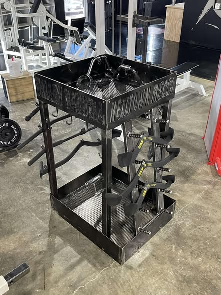 Finished custom rack with cut lettering in a gym