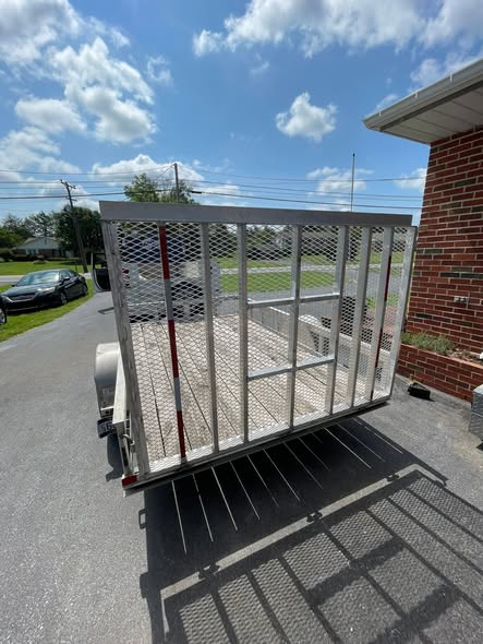 Finished aluminum trailer ramp with expanded metal decking